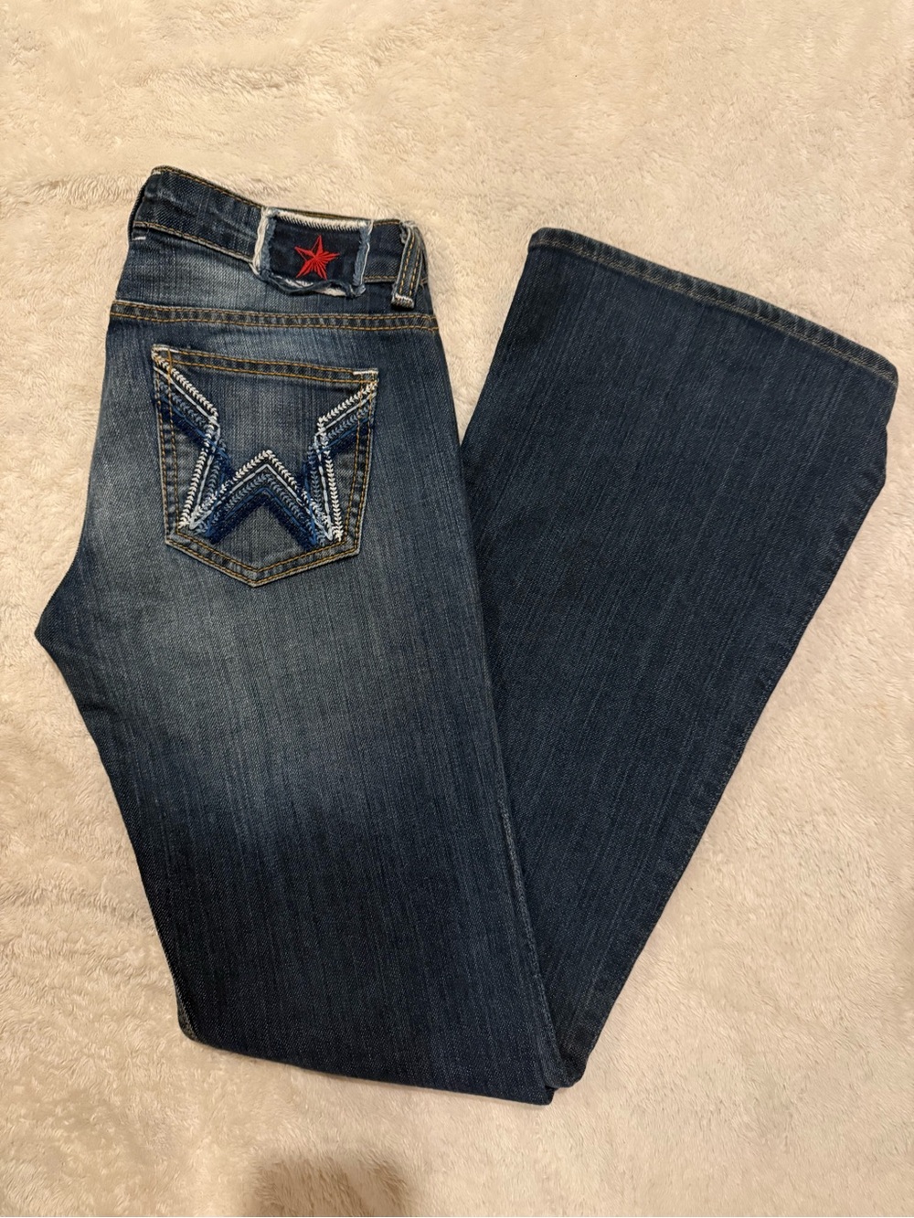 People's Liberation Dark Blue Flare Jeans with Red Star Detail